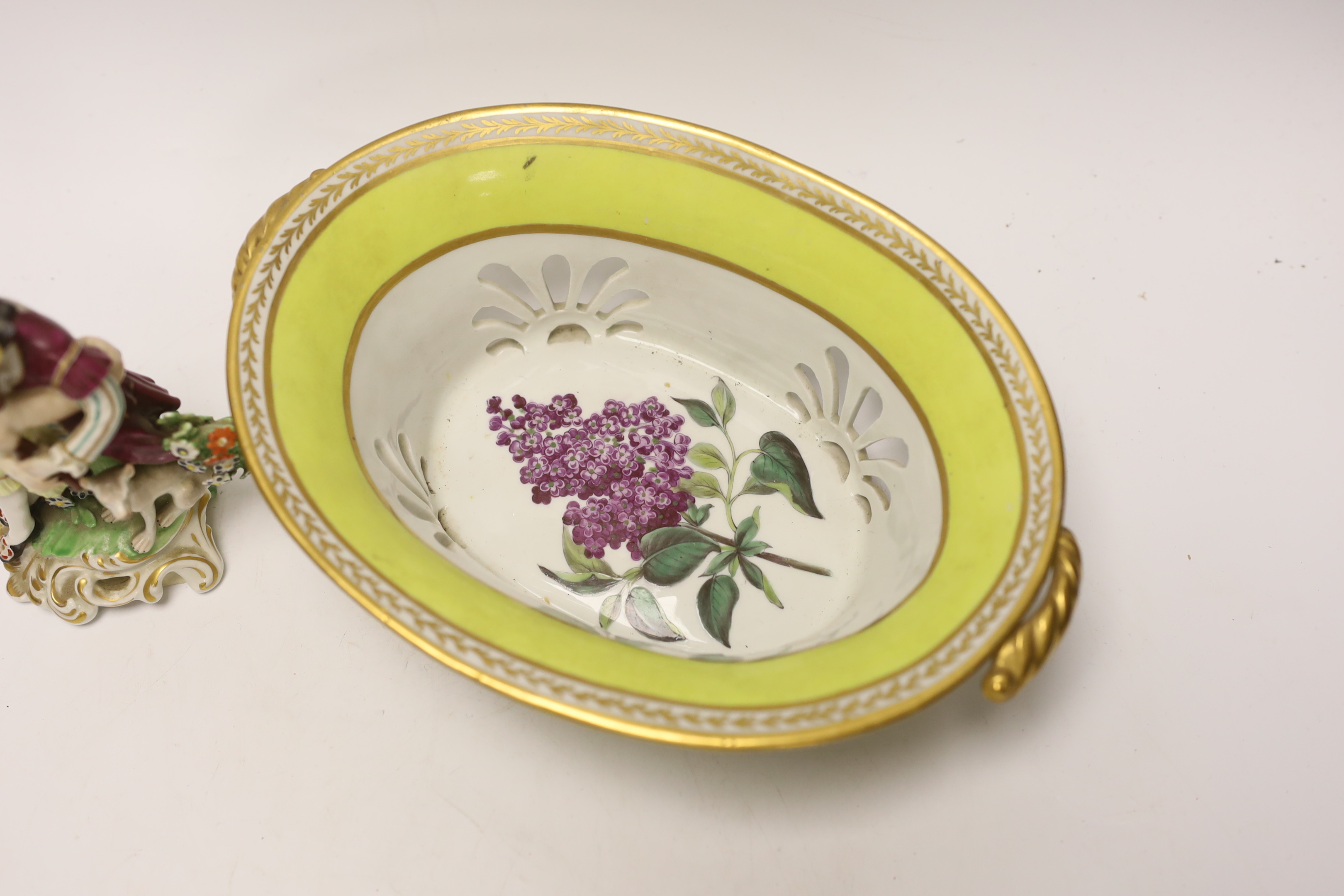 An English porcelain yellow ground botanical specimen basket, c.1795–1800 19th century Derby figure group together with a Victorian ‘Common Lilac’ dish, 25cm